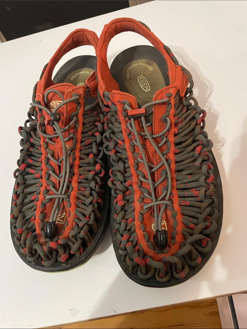 Keen Men's UNEEK Sandals in Orange and Olive